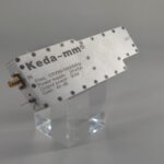 Keda - mm RF signal jammer module 5.8GHz on a transparent stand