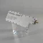 Keda - mm UAV power amplifier module on a clear stand