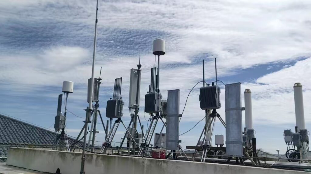 Rooftop - mounted 5G communication base stations with antennas and signal equipment