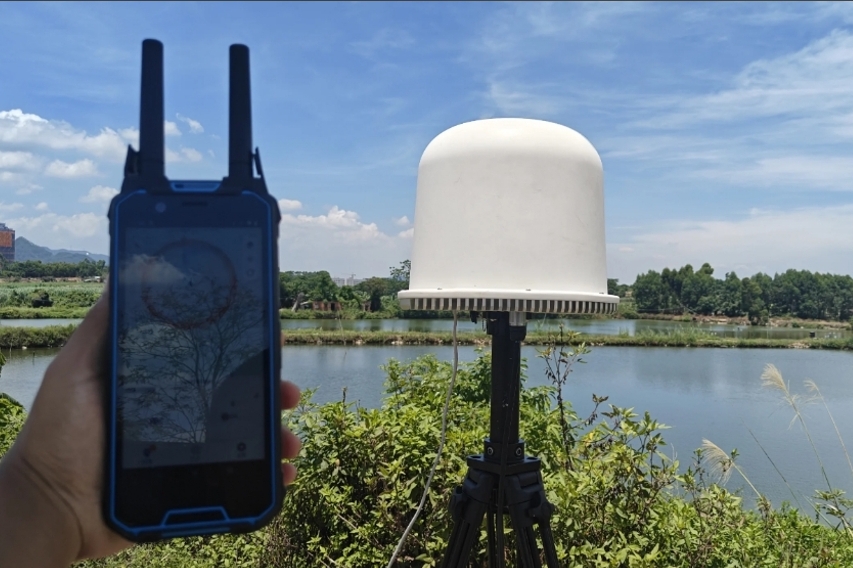 Handheld and dome - shaped portable drone detection gear near a water body